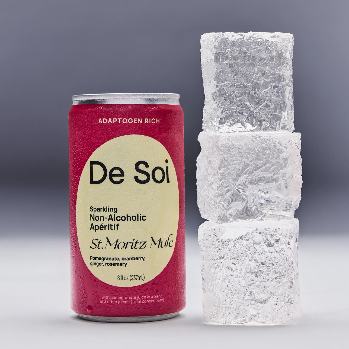 Best non-alcoholic apéritifs like De Soi St. Moritz Mule are served ice-cold, shown here beside stacked ice cubes.