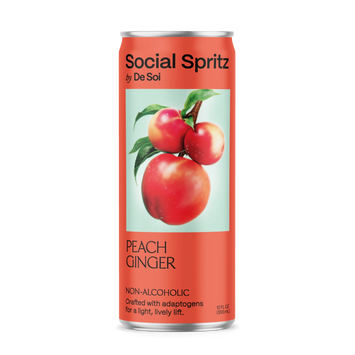 A can of Social Spritz by De Soi in Peach Ginger, a non-alcoholic adaptogen drink, with ripe peaches on a mint green background.